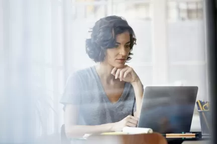 Woman in front of computer